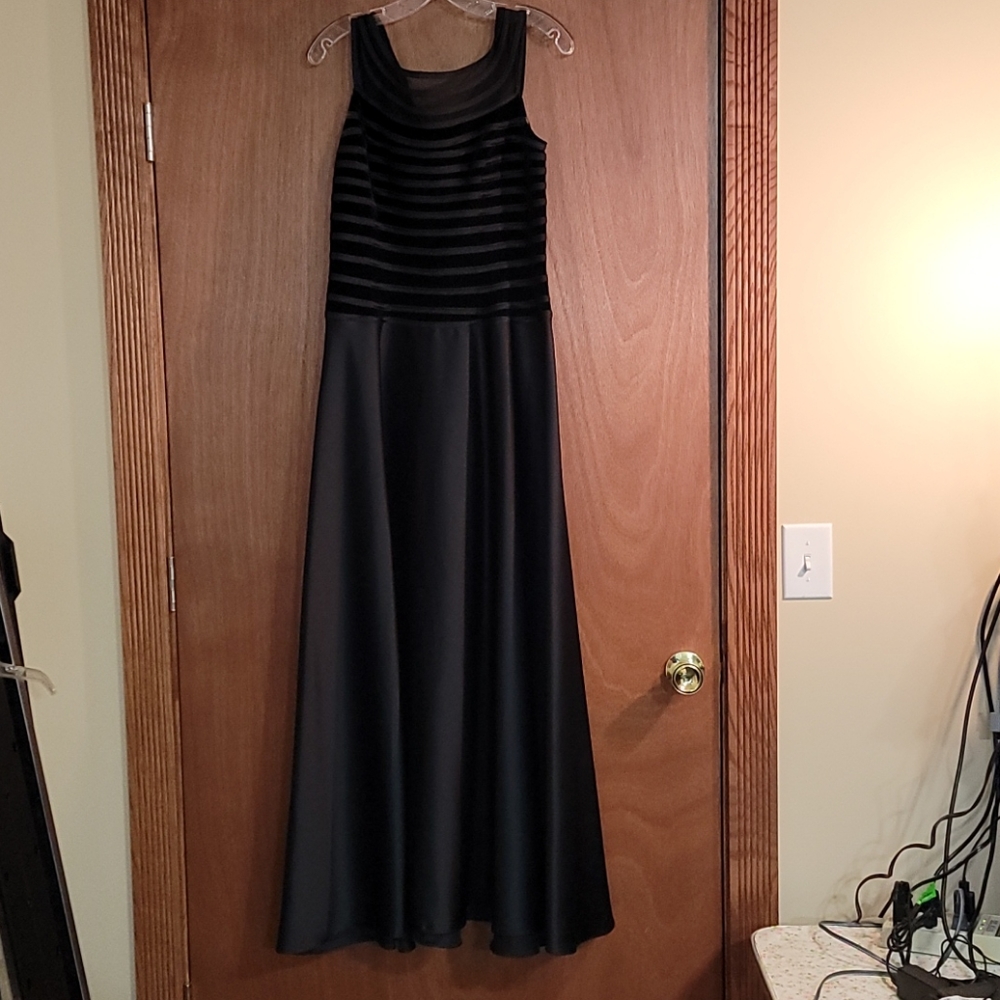 Striking black dress. Formal